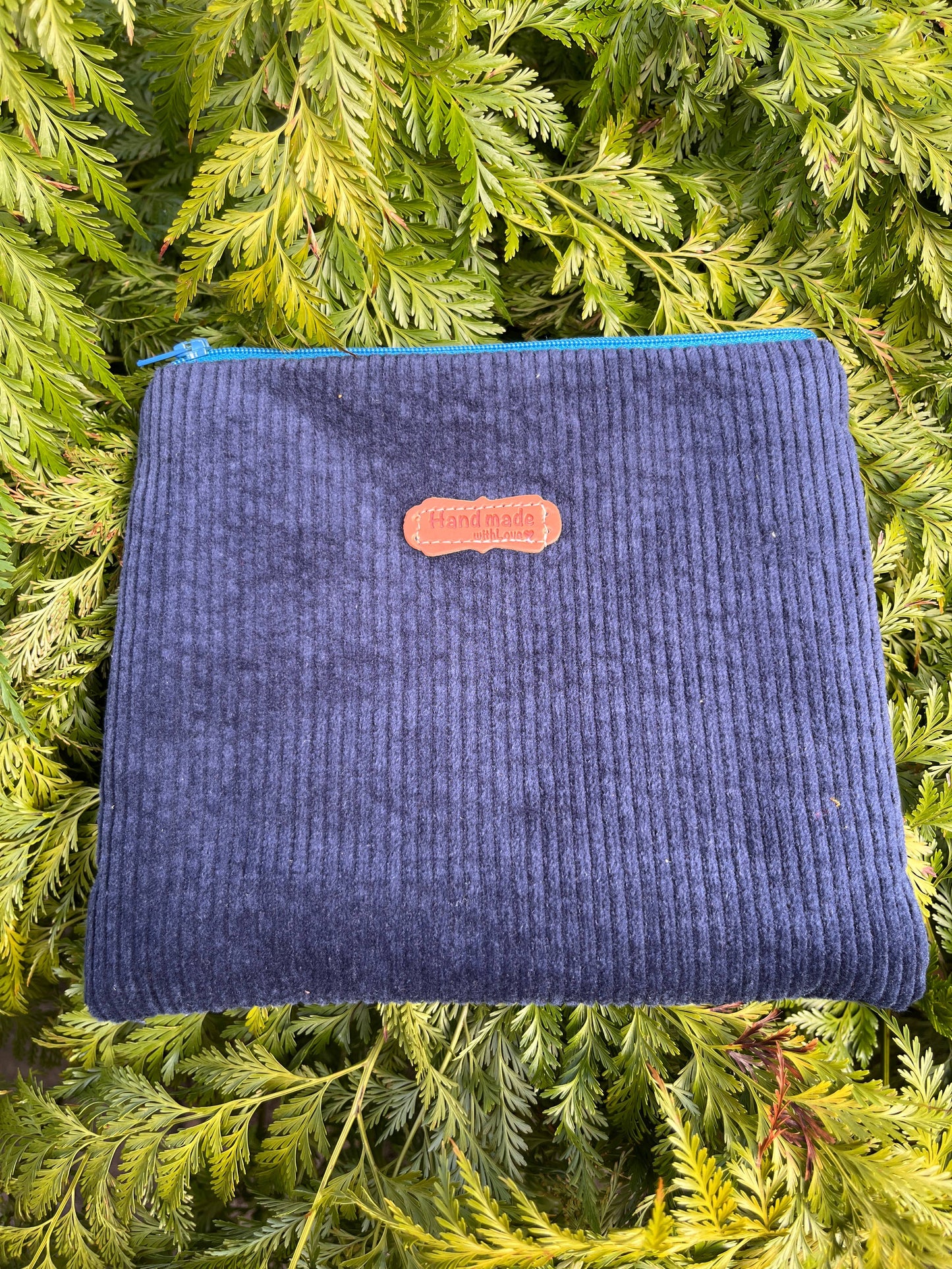 Pochette en velours côtelé